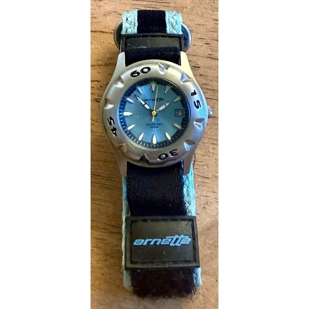Arnette‎ Woman's Round Face Analog Teal Watch, Date, 100mm Water Resistant